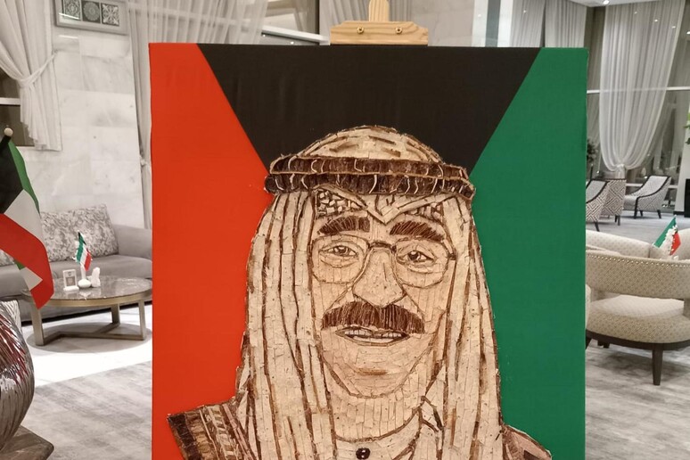 Reggio, mosaico con la pizza per la festa della liberazione del Kuwait